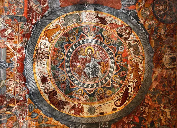 A fresco painting of a zodiac with Christ at the center.