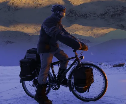 Me, on my winterized commuting mountain bike, about to ride off in the snow.